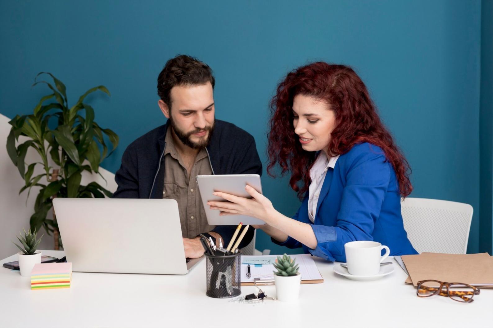 Professional financial planning workspace with calculators and budget documents